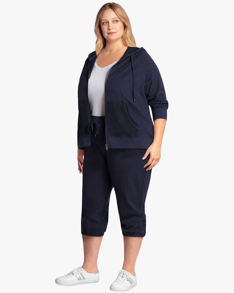 Plus size model with hourglass body shape wearing Kasa Hooded Jacket with Mesh Pockets by Marc NY | Dia&Co | dia_product_style_image_id:118317